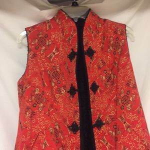 Reversible sleeveless jacket